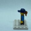 LEGO Minifigure Girl, Freckles, Dark Tan Vest Over Dark Azure Shirt, Dark Blue Cap - Image 4
