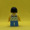LEGO Child - Girl, White Halter Top Minifigure with Green Apples and Lime Spots, Medium Blue Short Legs, Black Bob Cut Hair, Freckles - Image 4