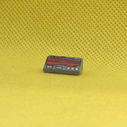 LEGO Part Slope 30 1 x 2 x 2/3 with Dark Red Horizon Screen and Gold Switches and Buttons Pattern